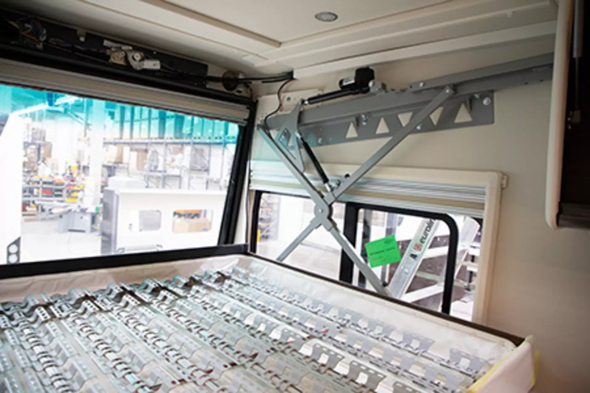 The LA28 Compact electric cylinder from LINAK® adjusts the lifting bed above the driver cockpit in the MORELO motorhome