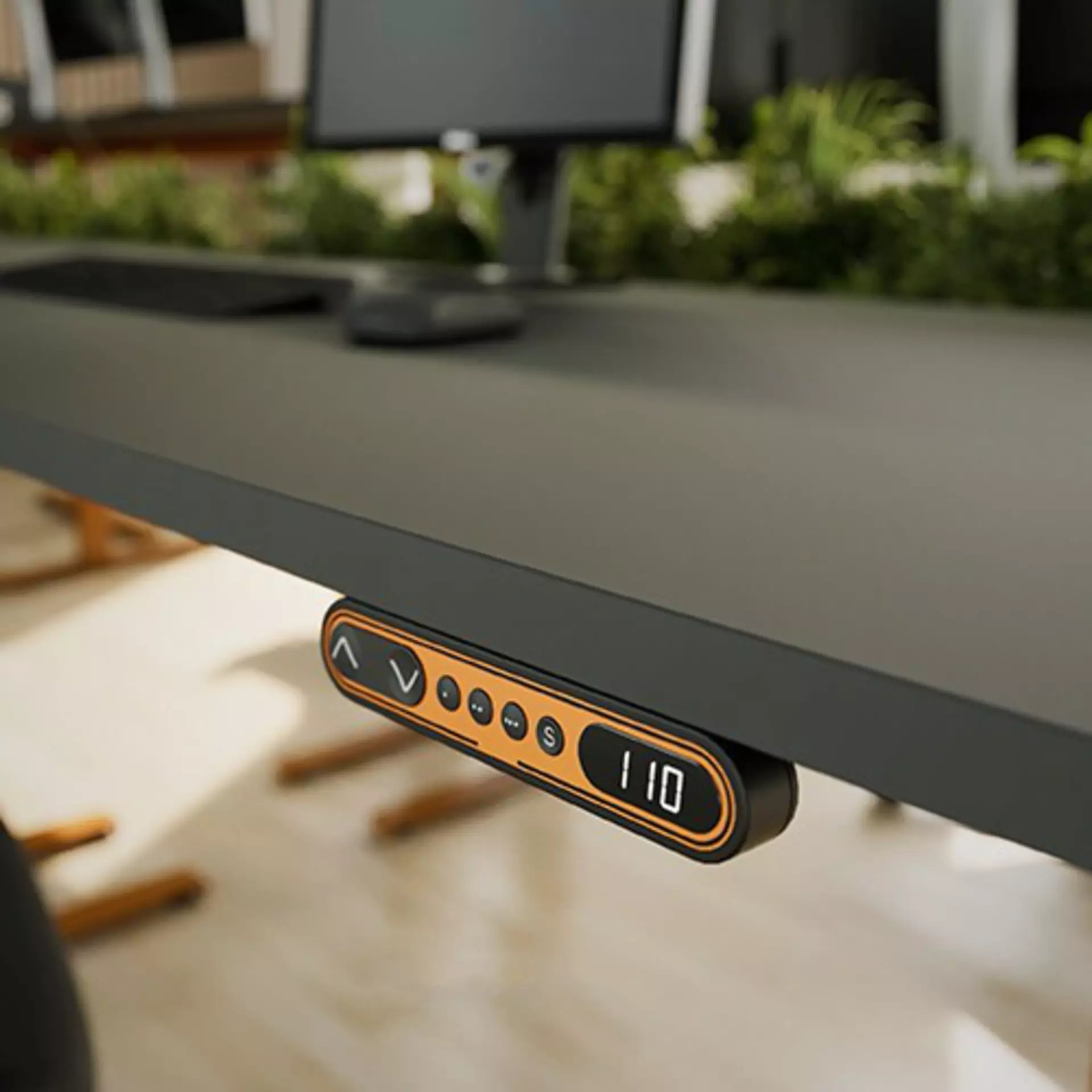 A customized front foil on a DPF desk panel with display on a modern height adjustable office desk