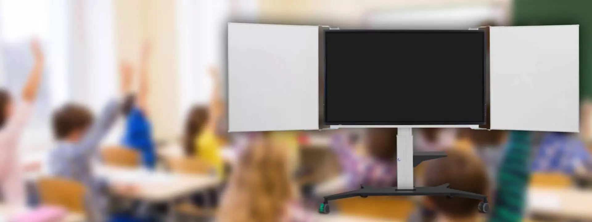 Modern display stand in classroom. Electrically adjustable: better visibility for the audience - improved ergonomics for the teacher.