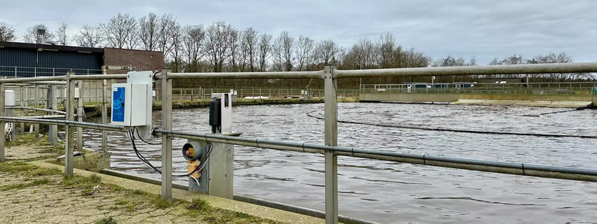 Electric actuators adjust tilting weirs on process tank at wastewater treatment plant