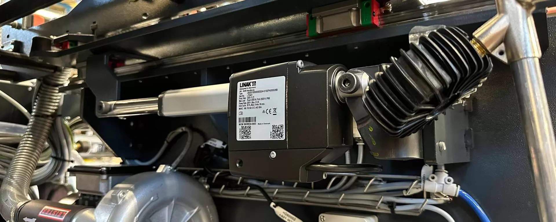 LINAK LA25 actuator with EtherNet/IP moving to adjust a Schur packaging machine during changeover