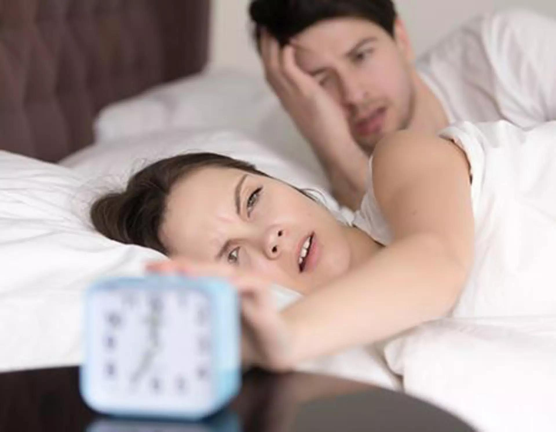 Enjoy a comfort bed with a silent alarm feature