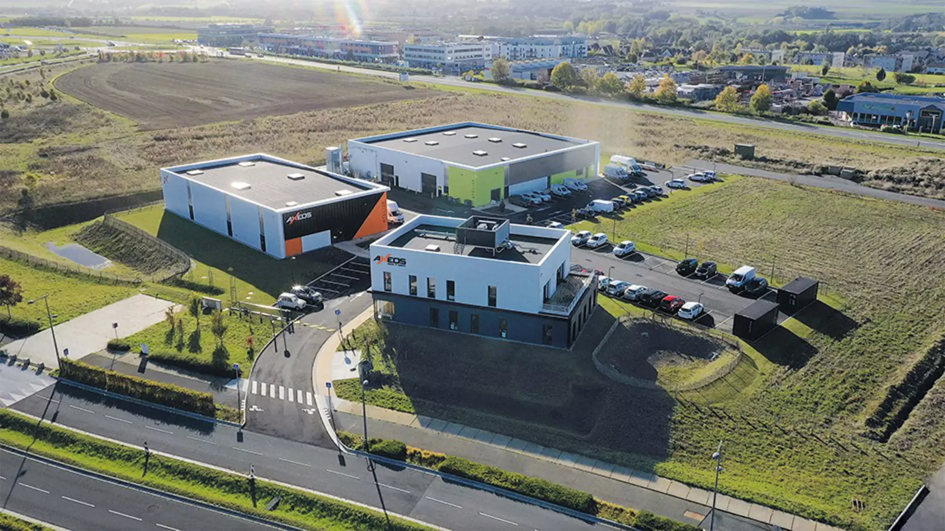 Air view of AXEOS factory in the green countryside - near Caen, Calvados in France