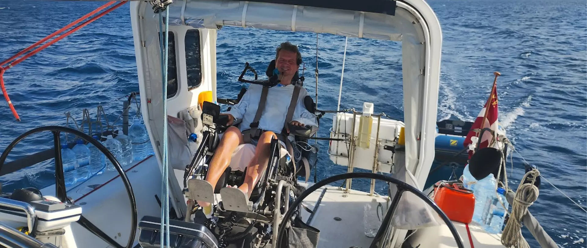 Anders Lehmann on a boat, sailing on the open sea.