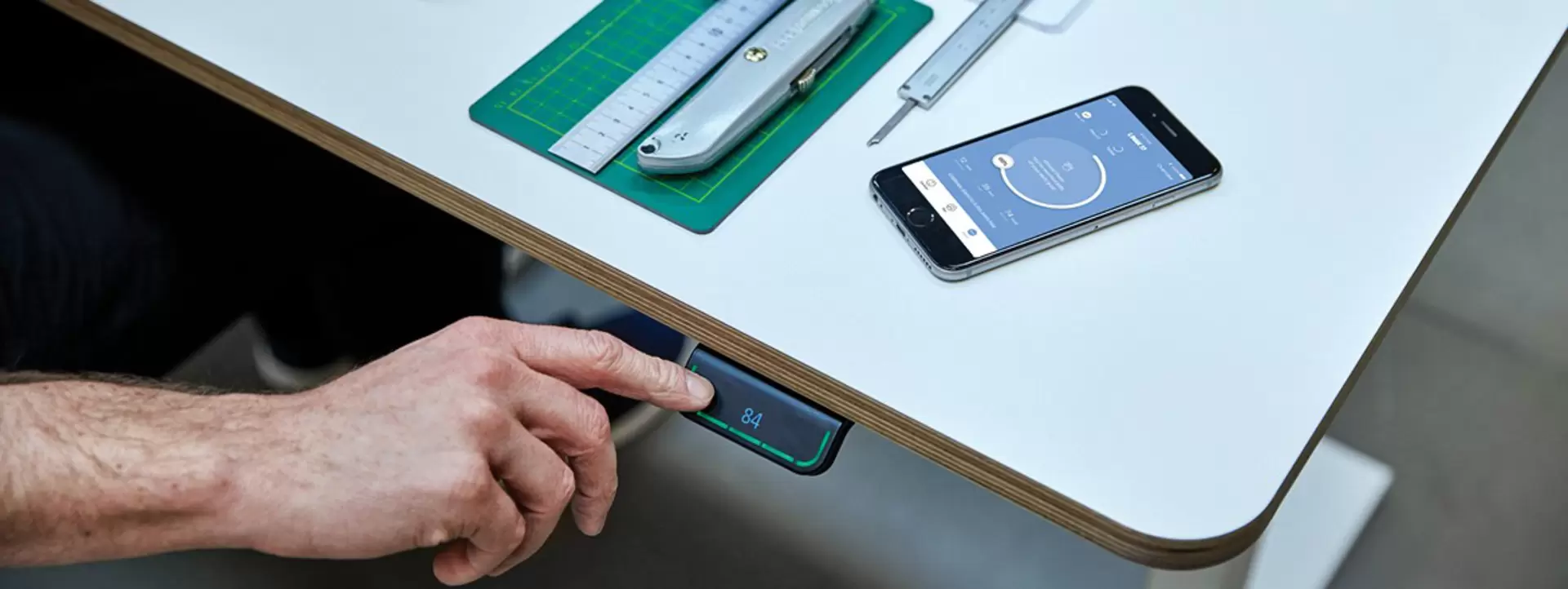 DPG og Desk Control App på bord