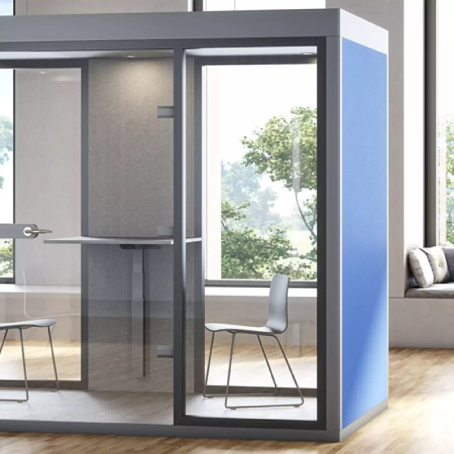 Acoustic office phone- and meeting booth with focus on improved ergonomics for the office worker with an adjustable table.