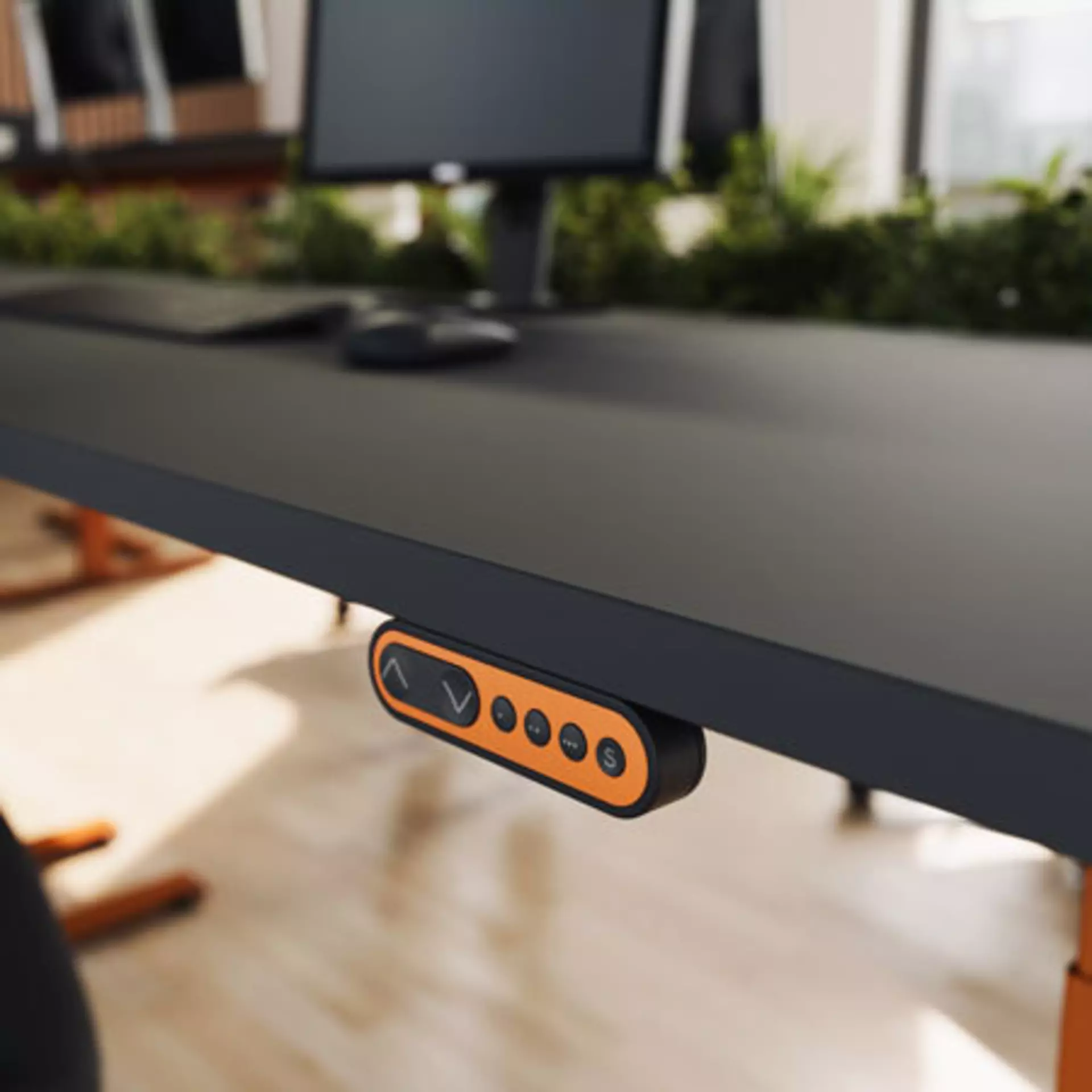 Customised DPF1C desk panel mounted on a height-adjustable office desk